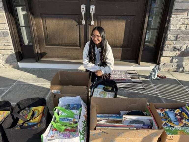 Sophia's Book Stand: Local Girl Continues to Share Love of Reading